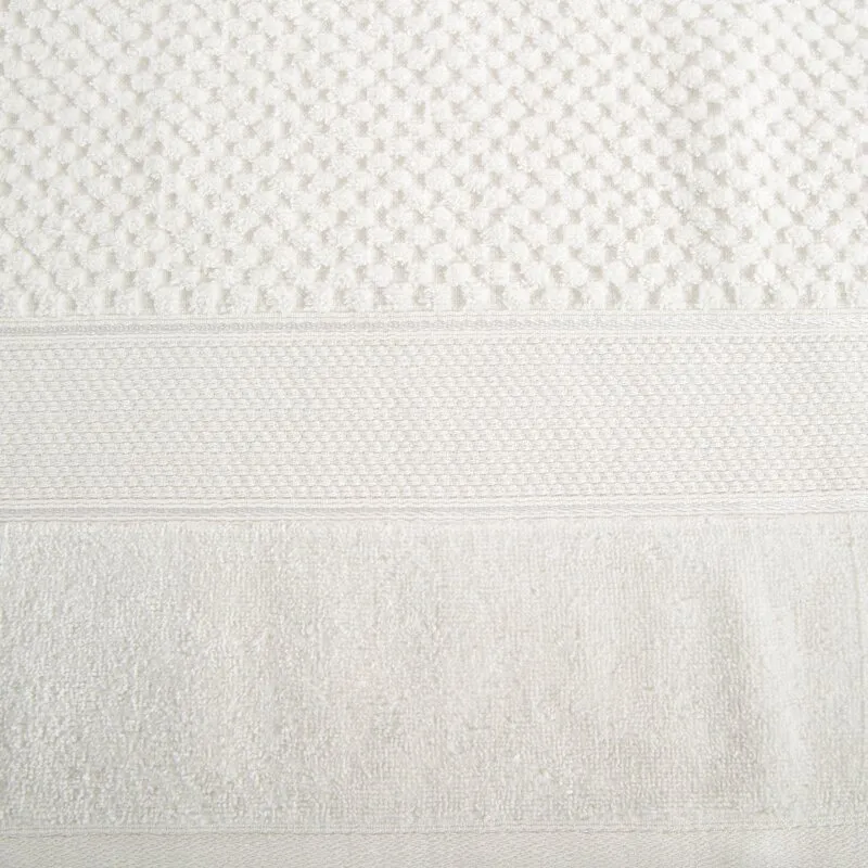 Ręcznik Jessi 90x150 kremowy frotte  500g/m2 z fakturą wytłaczanej krateczki i welurową bordiurą Eurofirany