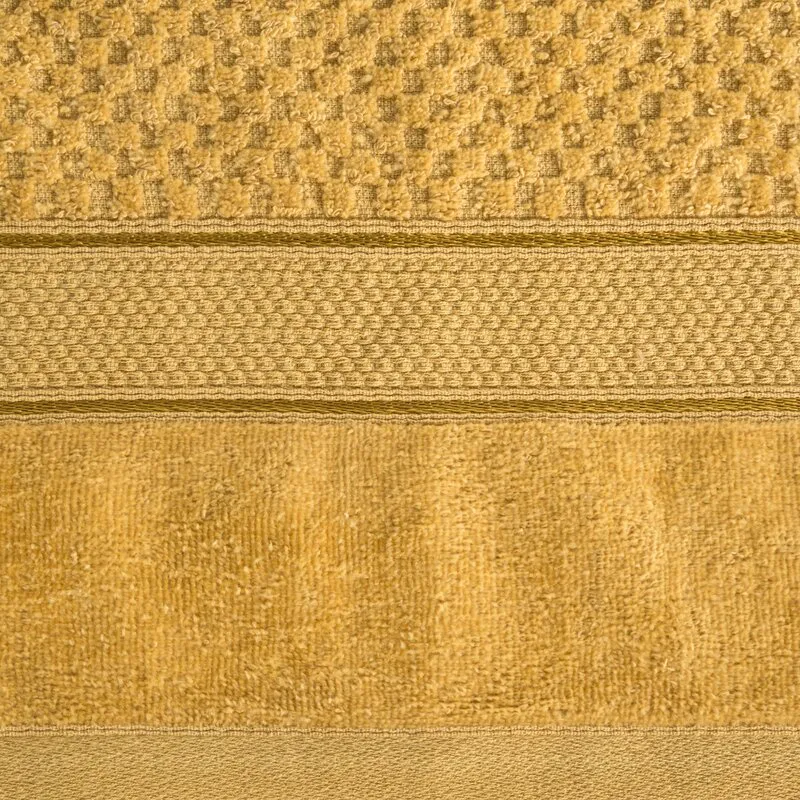 Ręcznik Jessi 90x150 musztardowy 500g/m2  z fakturą wytłaczanej krateczki i welurową bordiurą frotte Eurofirany